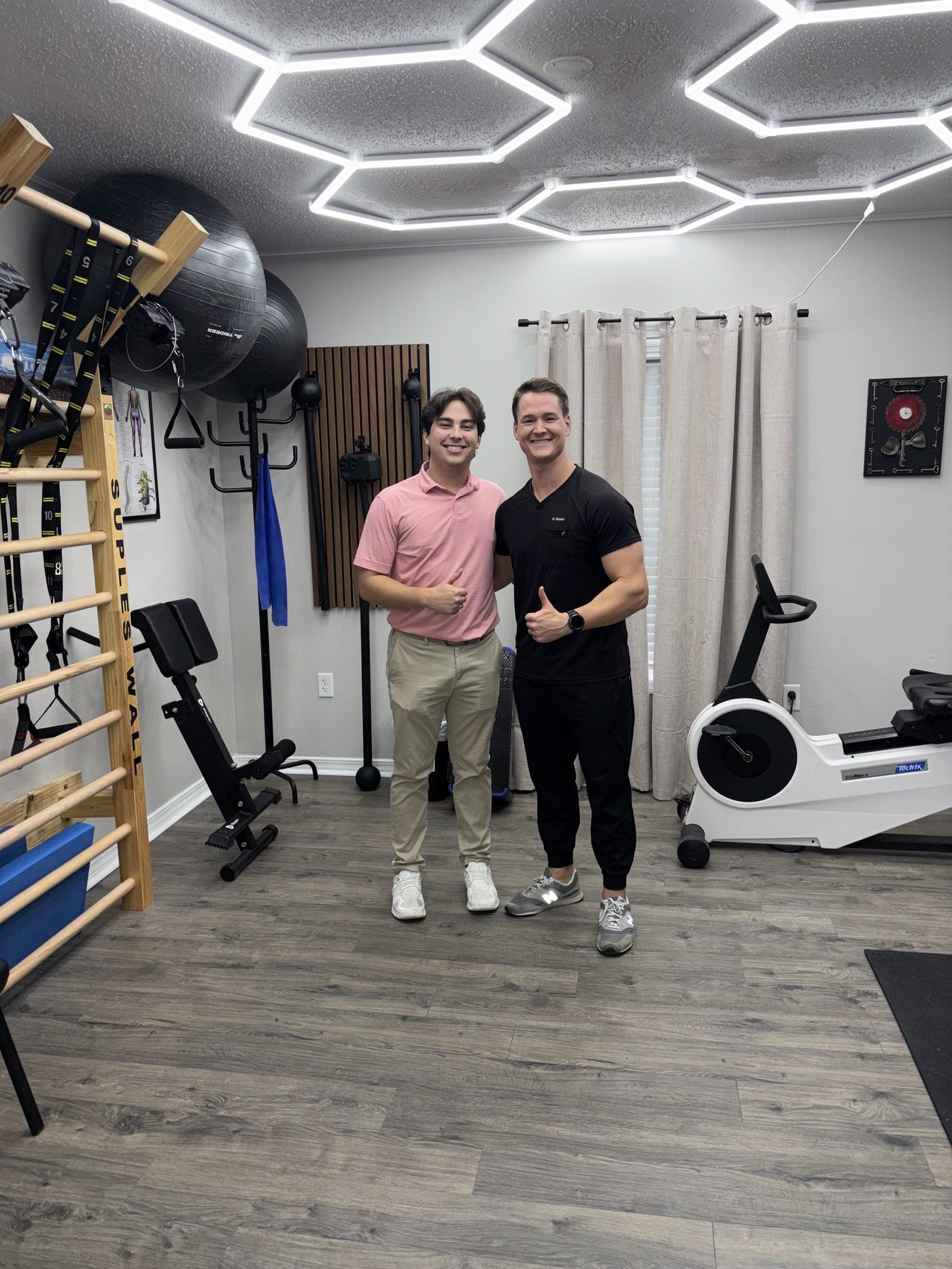 GT Physical Therapy clinic — Dr. Austin Baskin with patient, Pascagoula MS