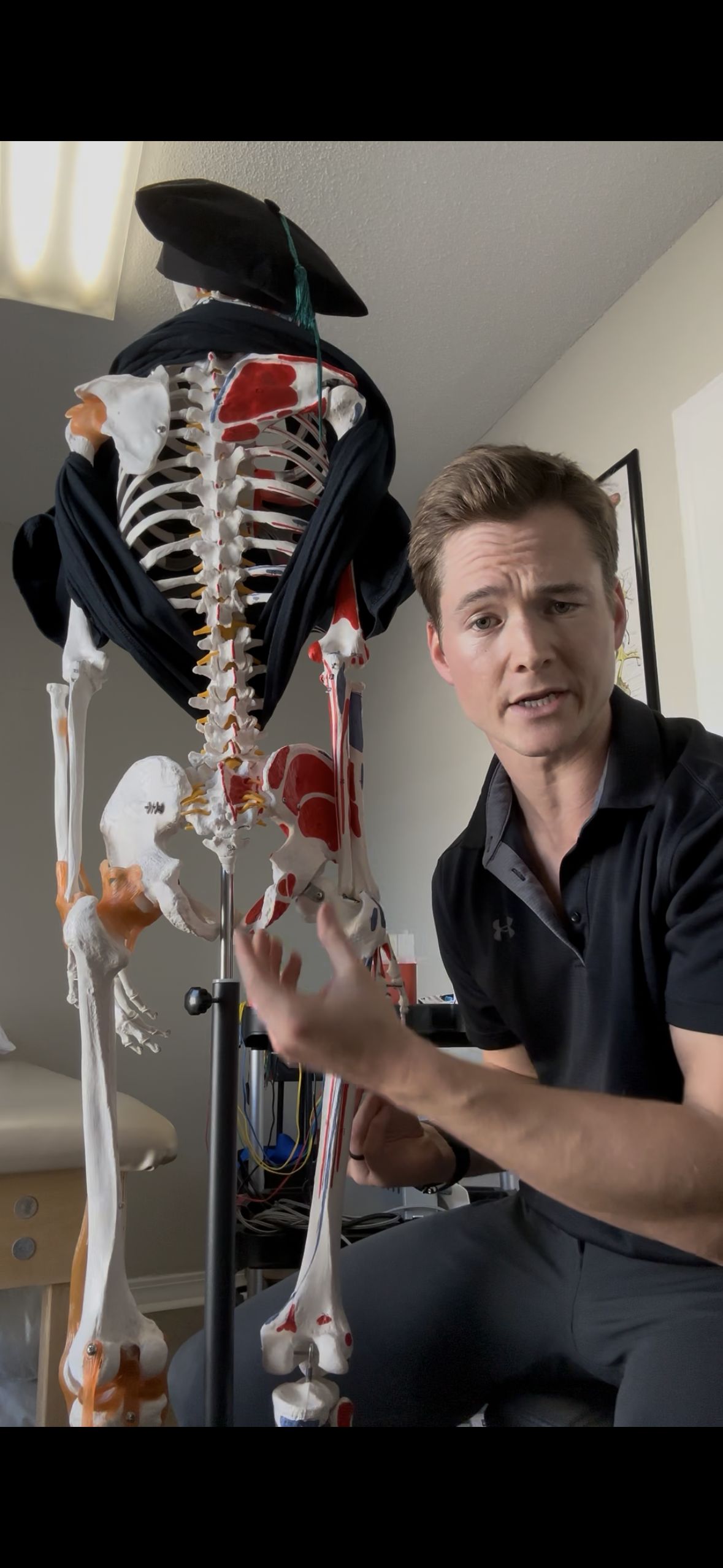 Dr. Austin Baskin PT DPT with anatomy model — clinical expertise GT Physical Therapy Pascagoula